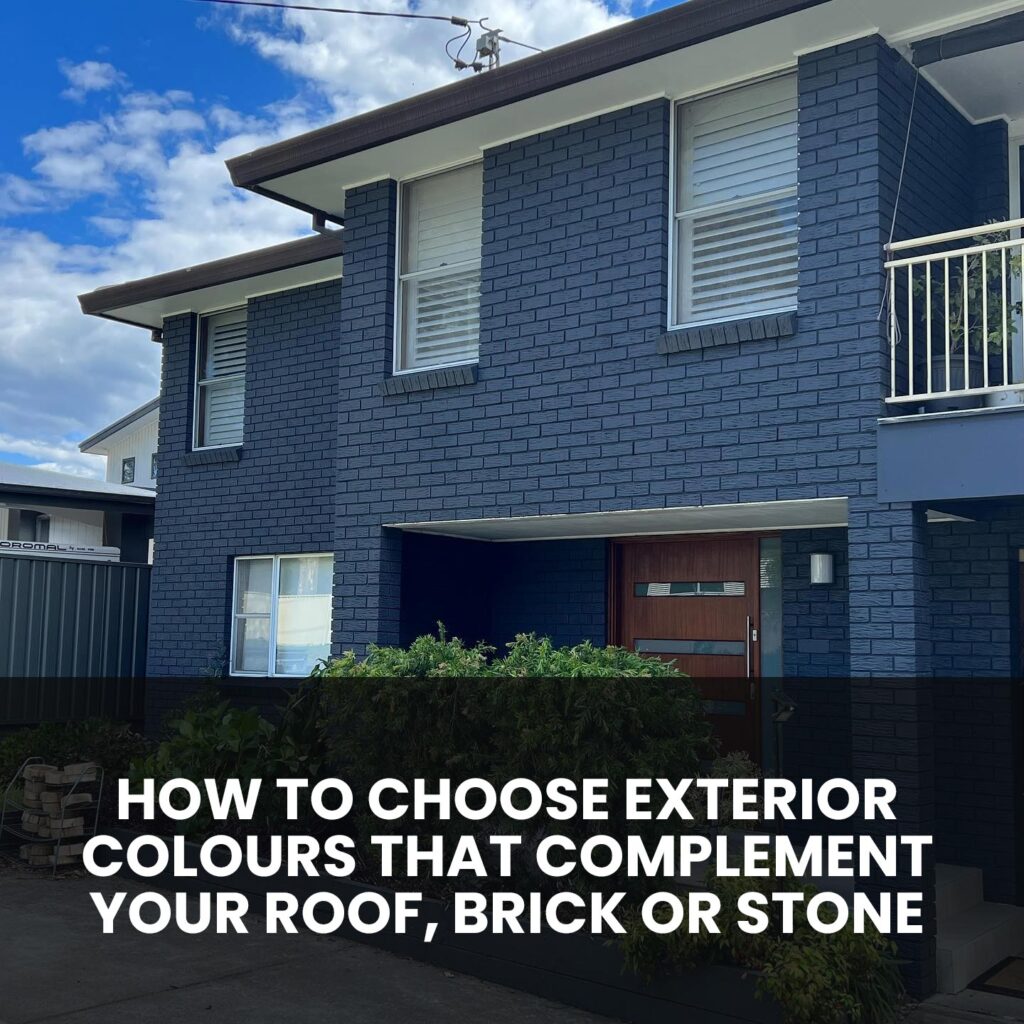 Two-storey brick home exterior painted in Viking Grey