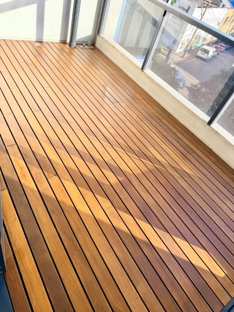 Freshly oiled timber balcony deck restored by AKD Painting in the Inner West Sydney